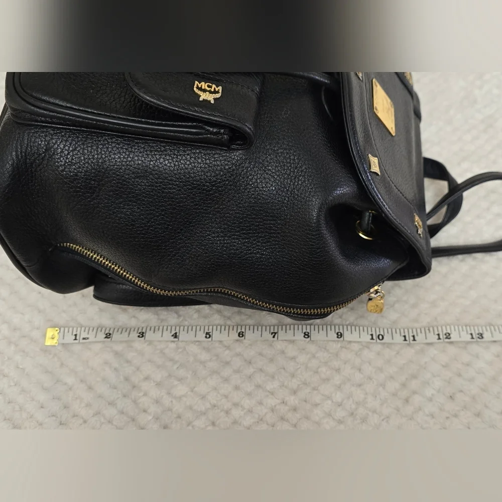 MCM Black Leather Studded Backpack Gold Hardware Drawstring Side Zip